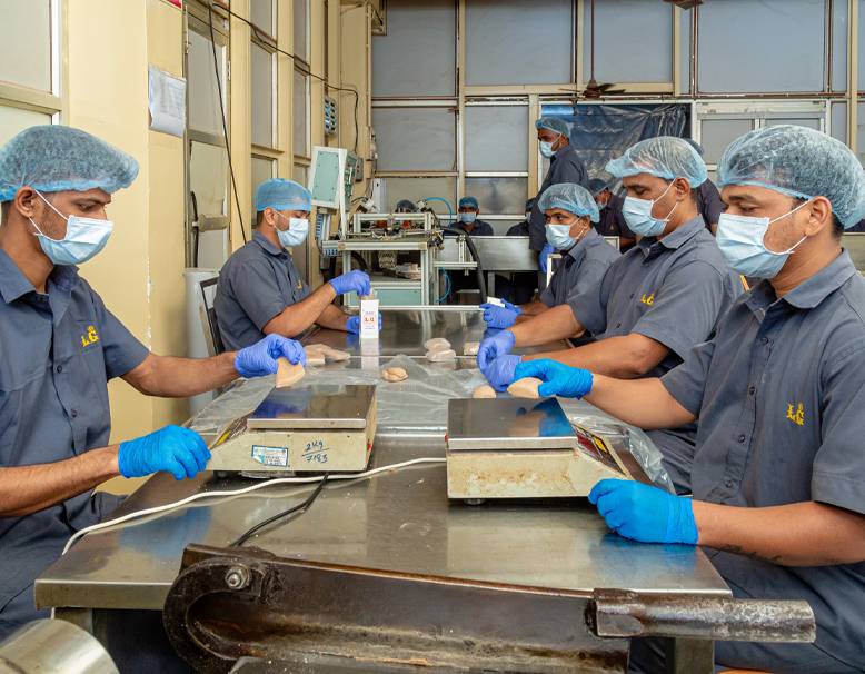 The dedicated team of Laljee Godhoo & Co. continuing the legacy of authentic Indian spices since 1894.